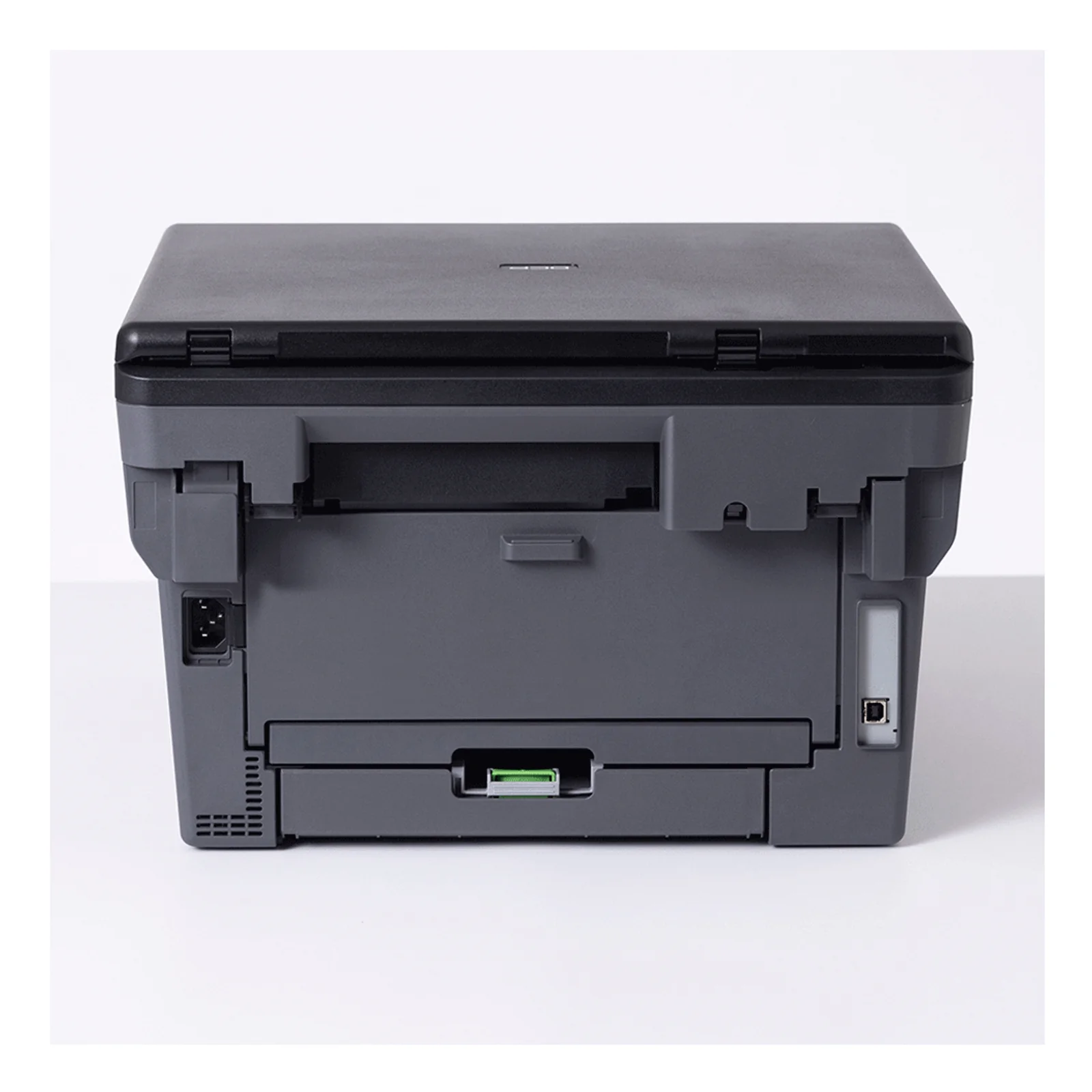 Vue arrière du DCP-L2627DWXL avec capot du recto-verso, port USB latéral et prise d'alimentation secteur