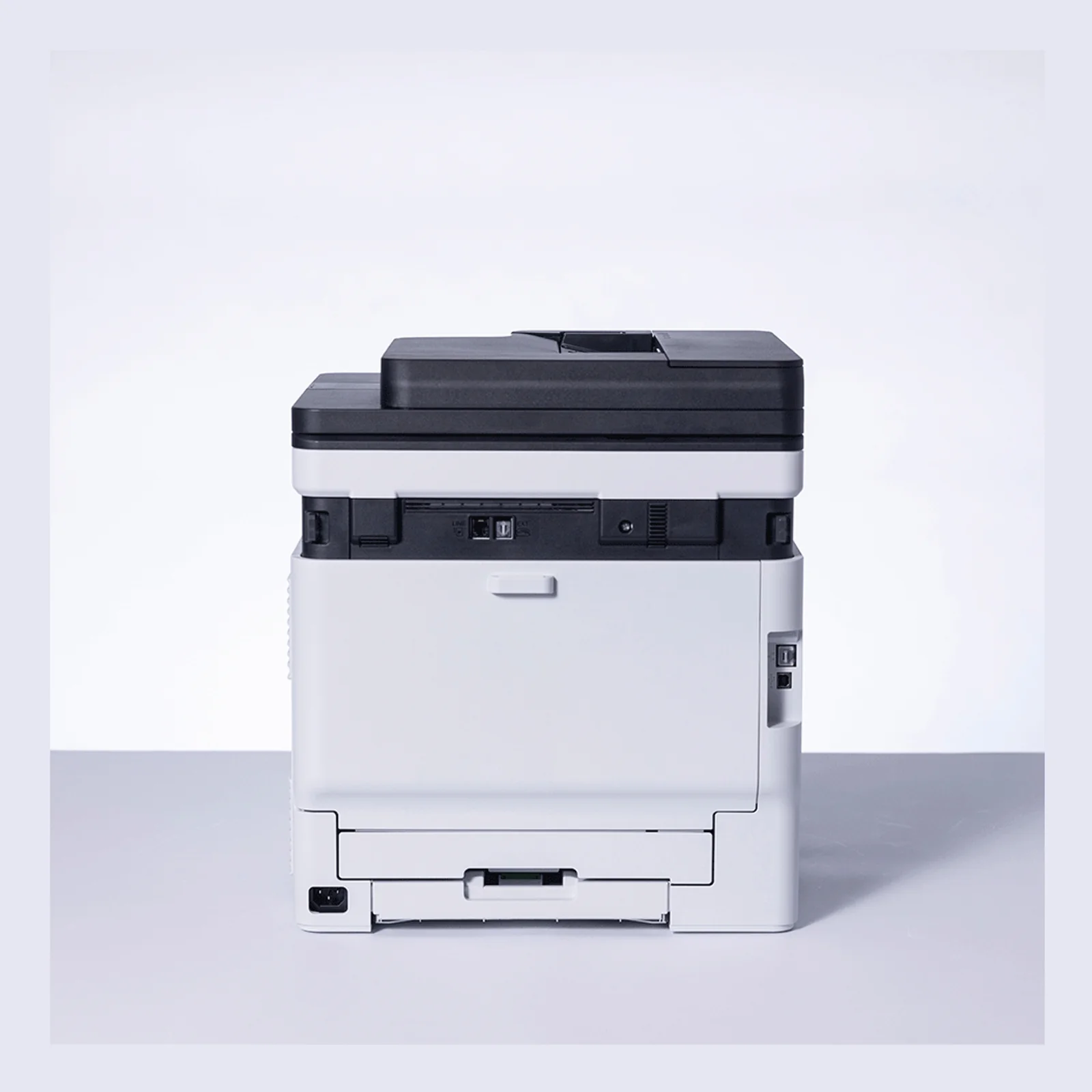 Vue arrière du Brother MFC-L8730CDW montrant les ports Ethernet, USB, ligne fax et la prise d'alimentation secteur
