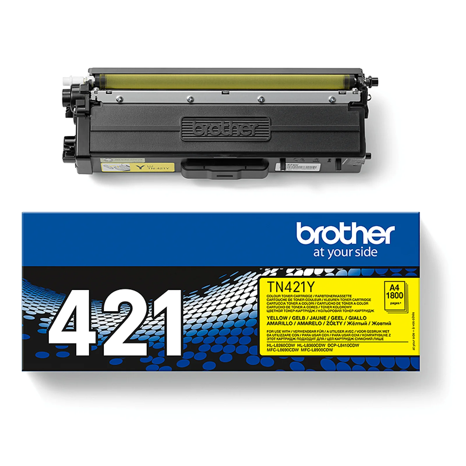 Cartouche toner Brother TN-421Y jaune posée au-dessus de sa boîte d'emballage bleue