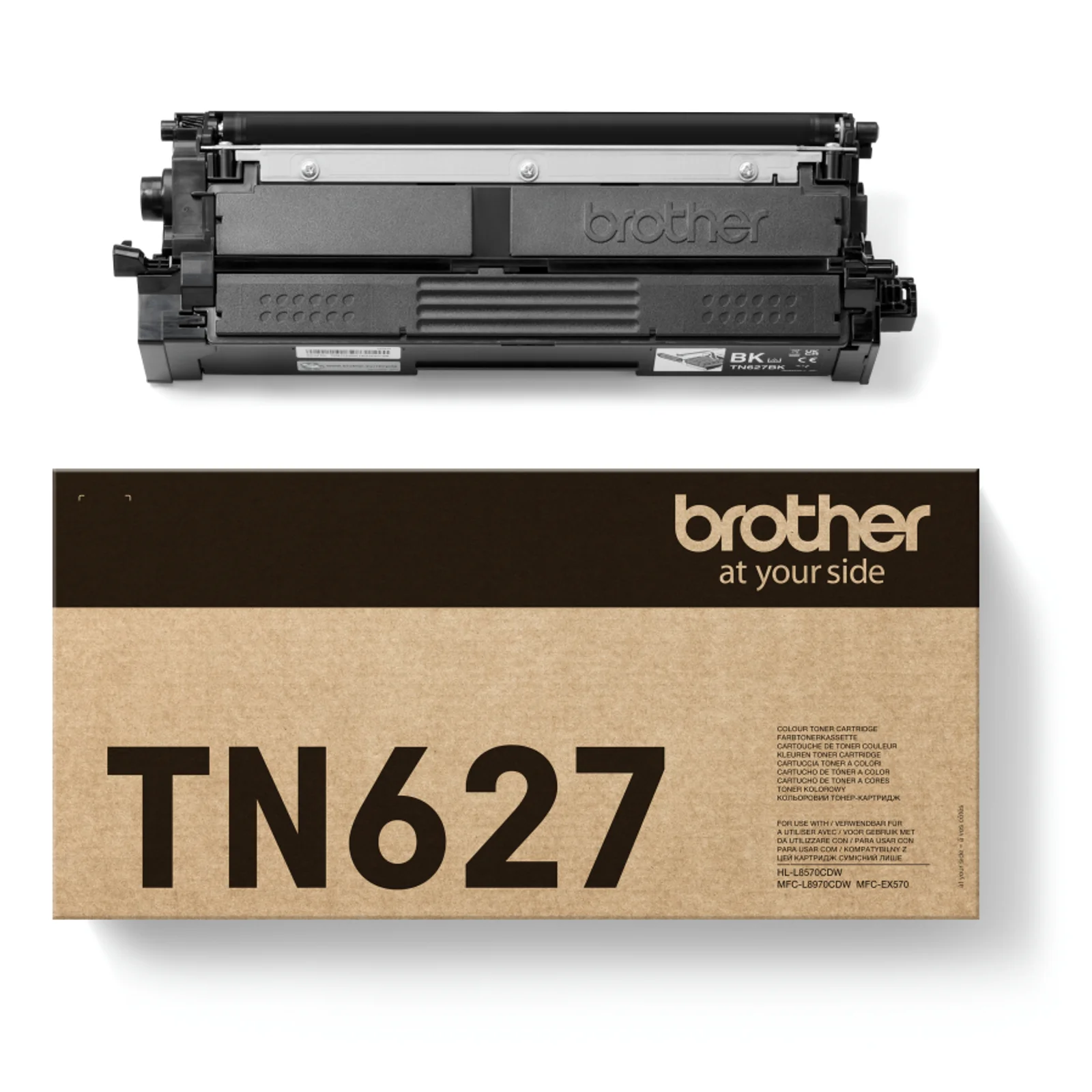 Cartouche de toner posée au-dessus de la boîte carton kraft Brother TN627