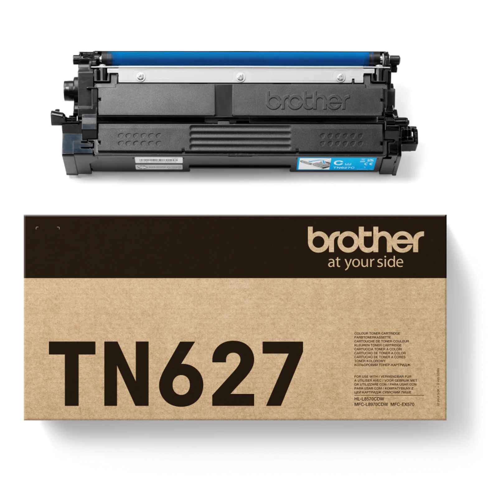 Cartouche de toner posée au-dessus de la boîte carton kraft Brother TN627