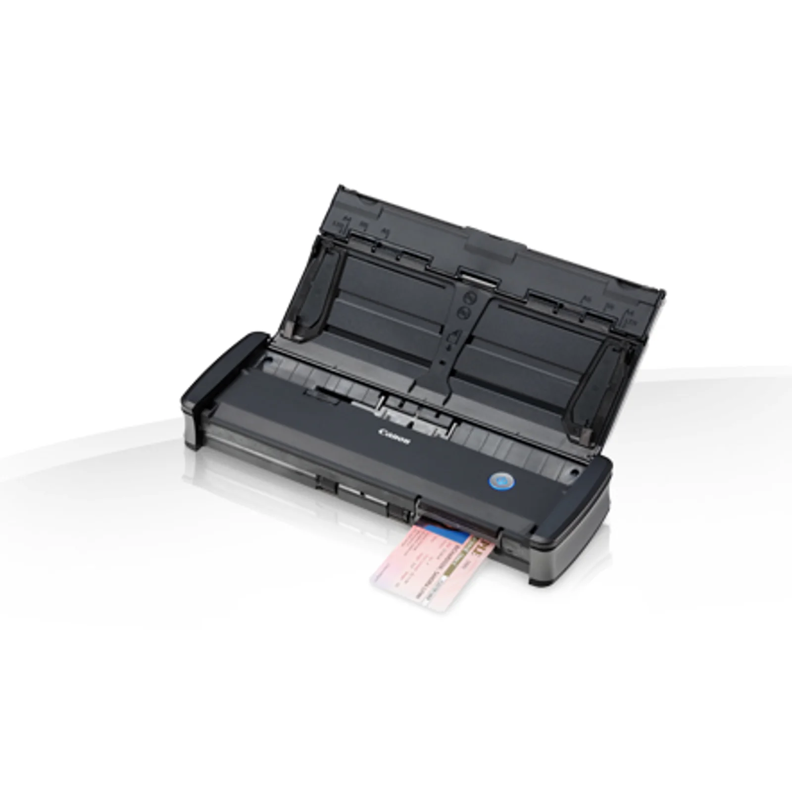 Scanner Canon P-215II ouvert numérisant une carte d'identité plastique en sortie avant.