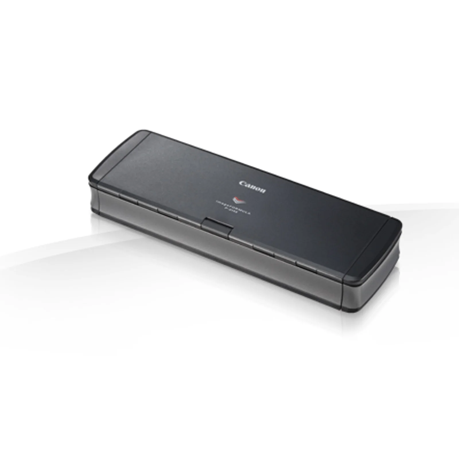 Scanner Canon imageFORMULA P-215II fermé en position transport, vue trois quarts.
