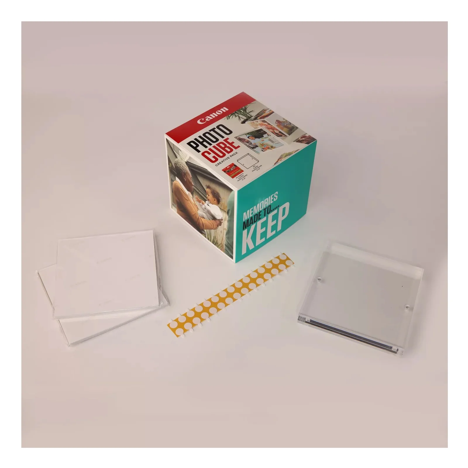 Contenu du pack Canon PP-201 avec feuilles de papier brillant ruban adhésif et cadre acrylique