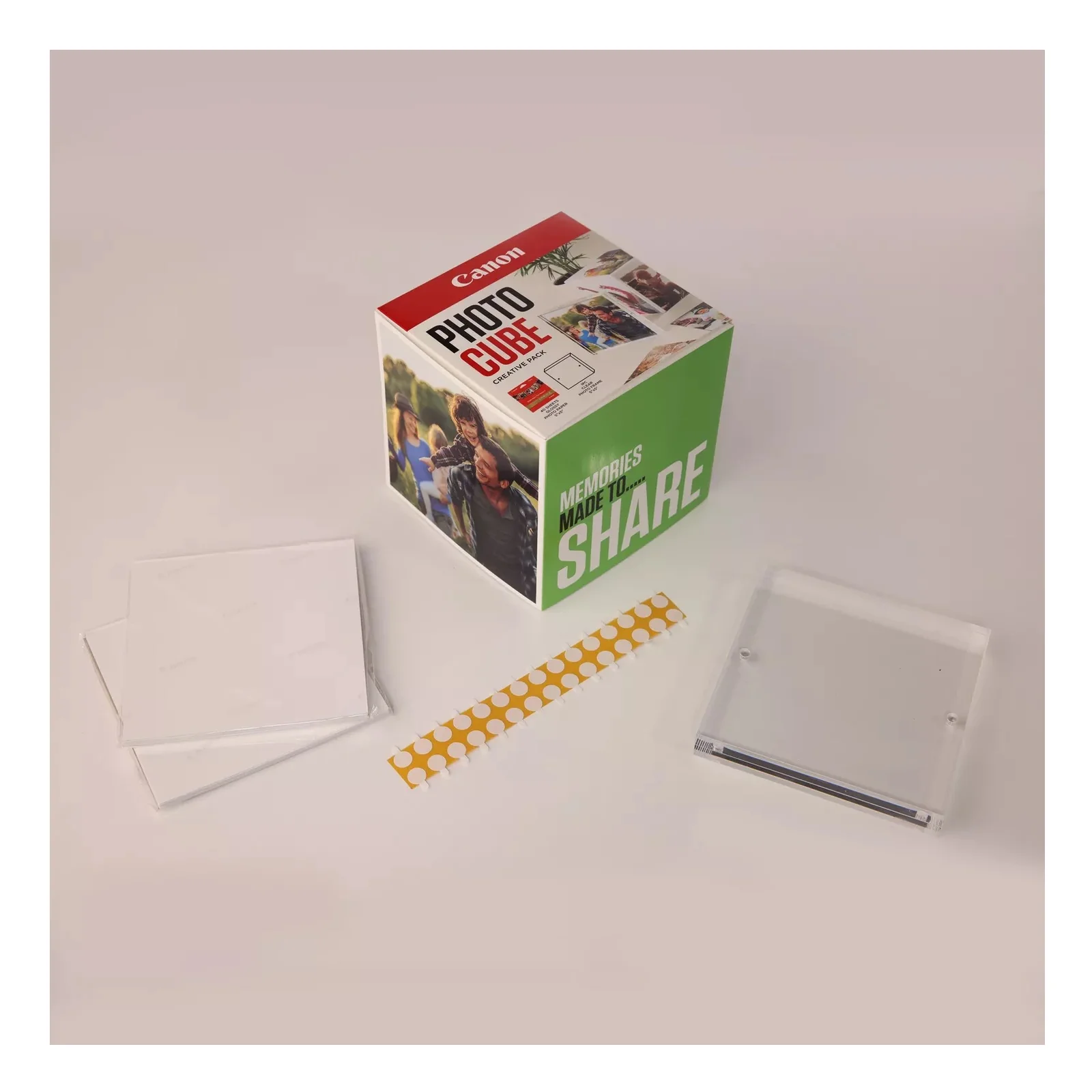 Contenu du pack Canon PP-201 avec feuilles de papier brillant ruban adhésif et cadre acrylique