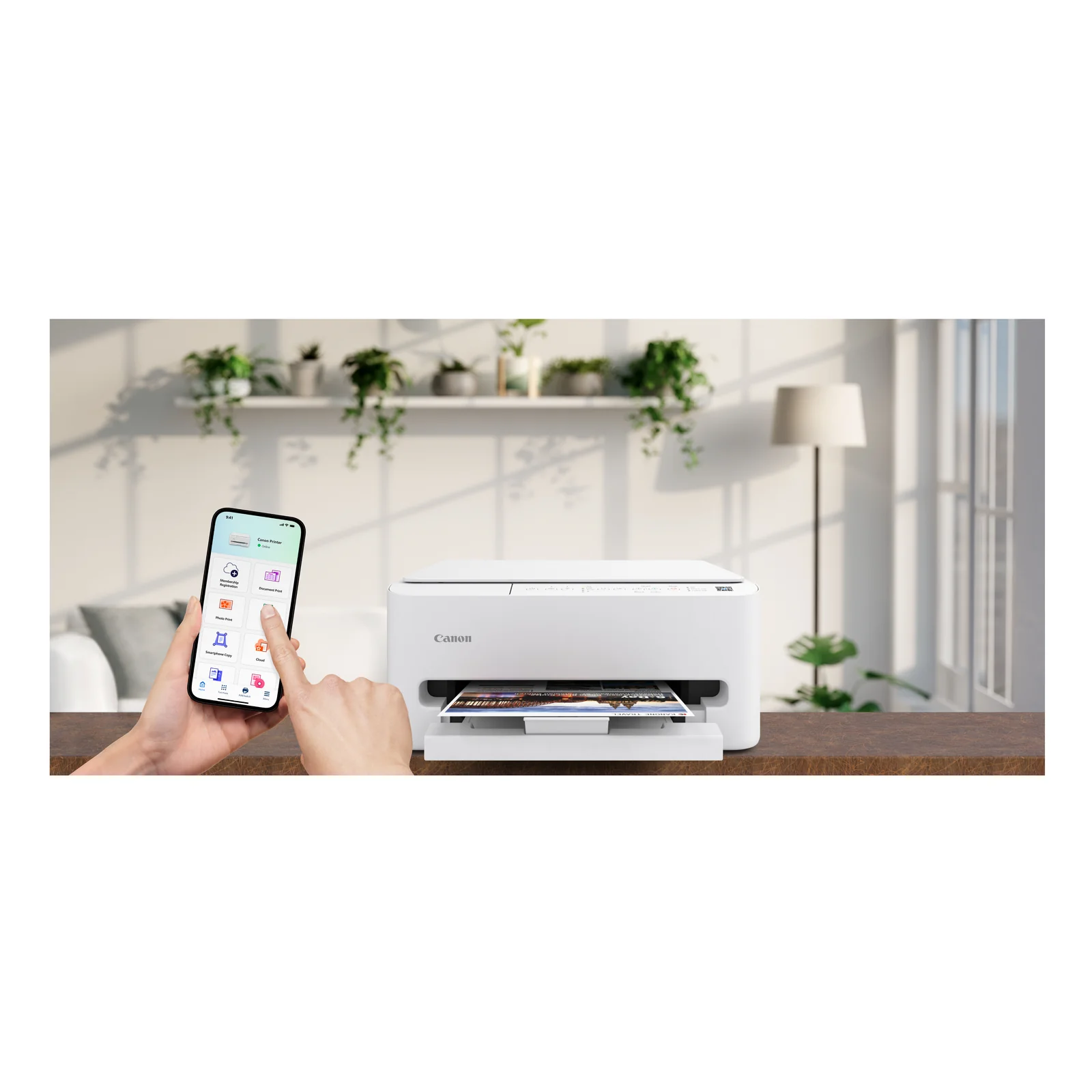 Canon PIXMA TS4150i posée sur bureau blanc minimaliste avec cactus