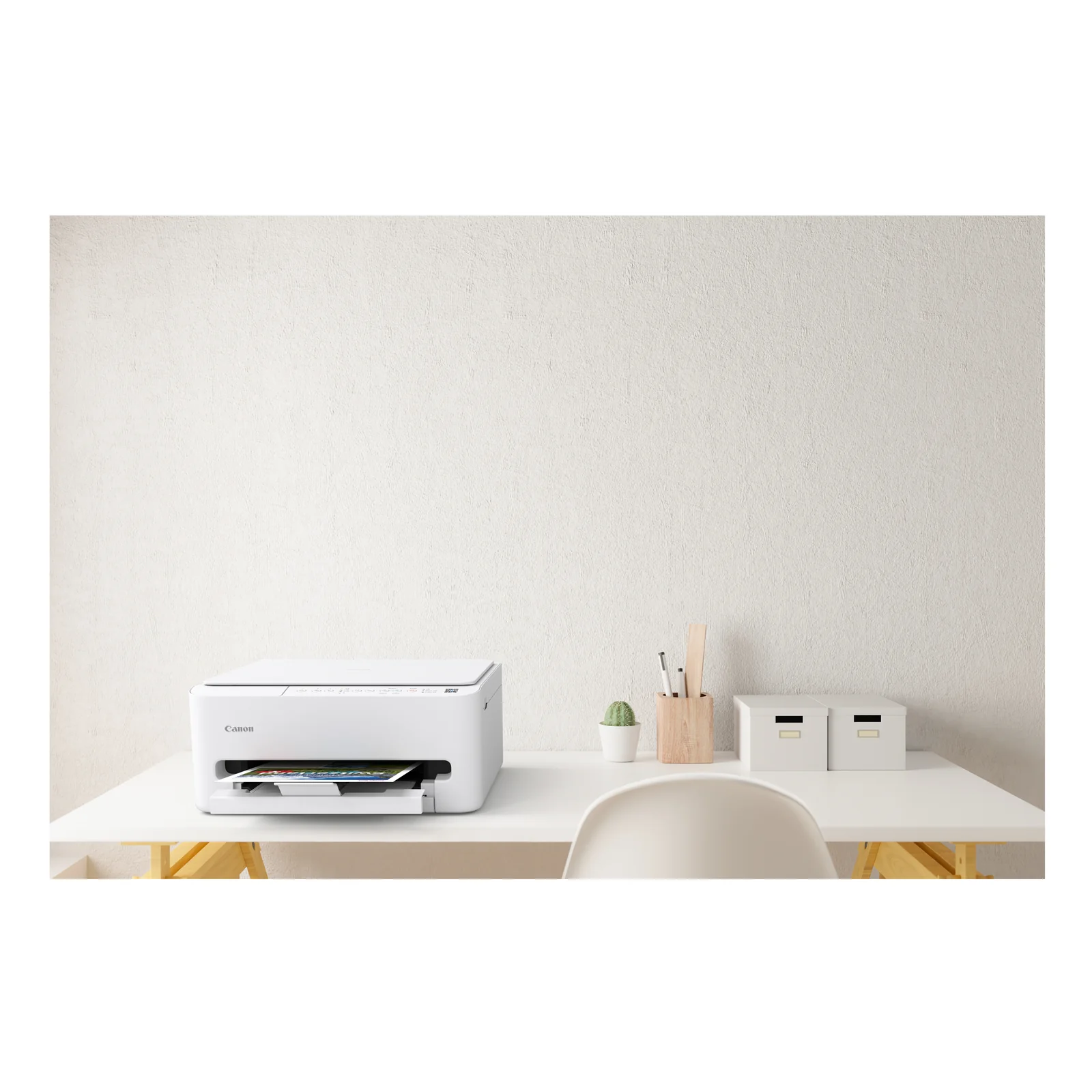 Canon PIXMA TS4150i blanc vu de dos posé sur surface neutre