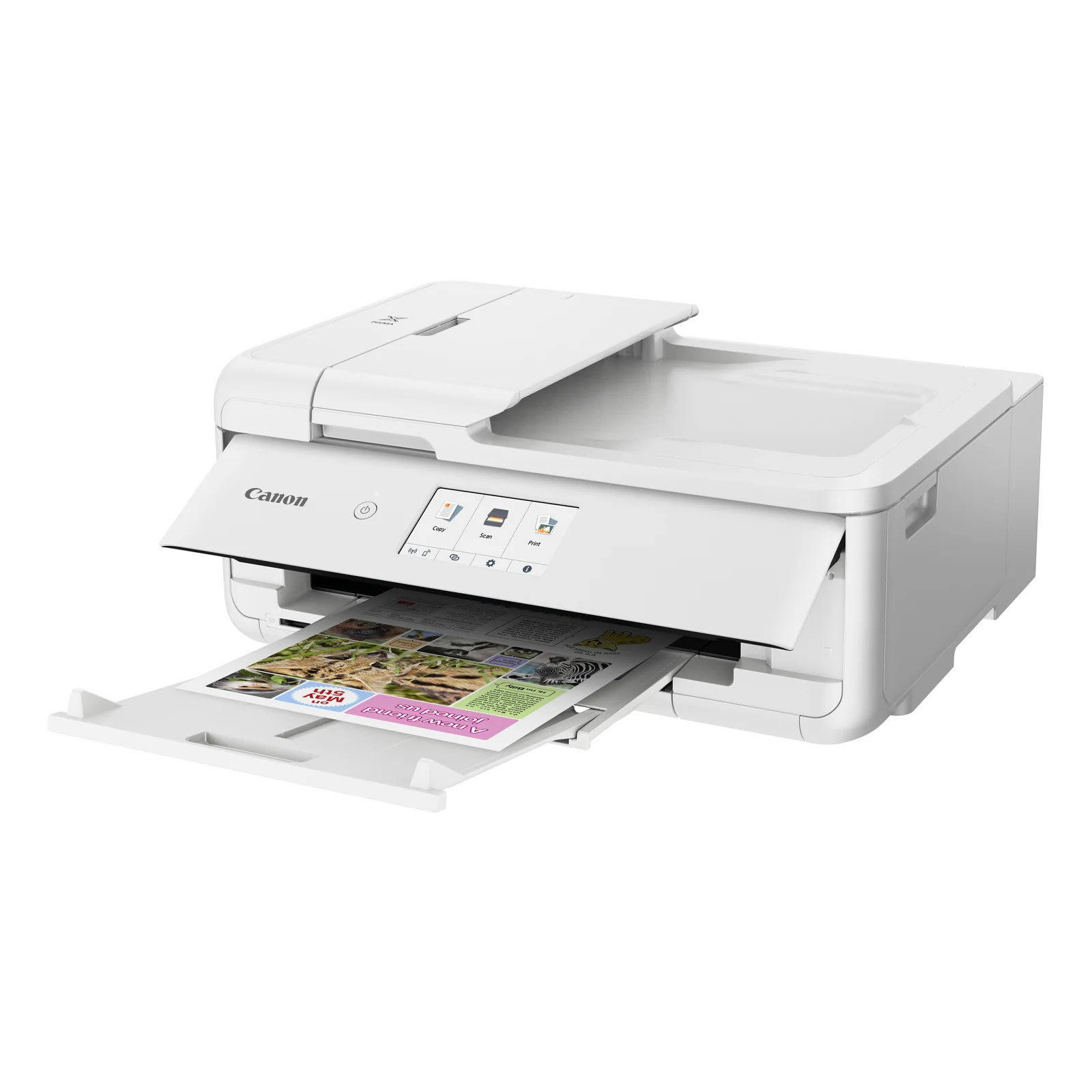 Main saisissant une page imprimée couleur sur le Canon PIXMA TS9551Ca
