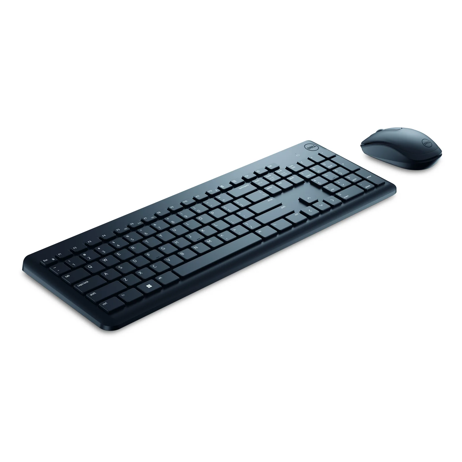 Vue trois-quarts arrière du clavier sous un éclairage doux avec souris positionnée en haut à droite