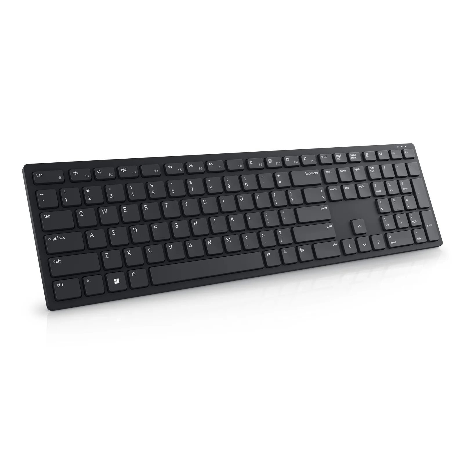 Vue trois-quarts du clavier noir mettant en valeur les touches plongeur peu profondes et le pavé numérique