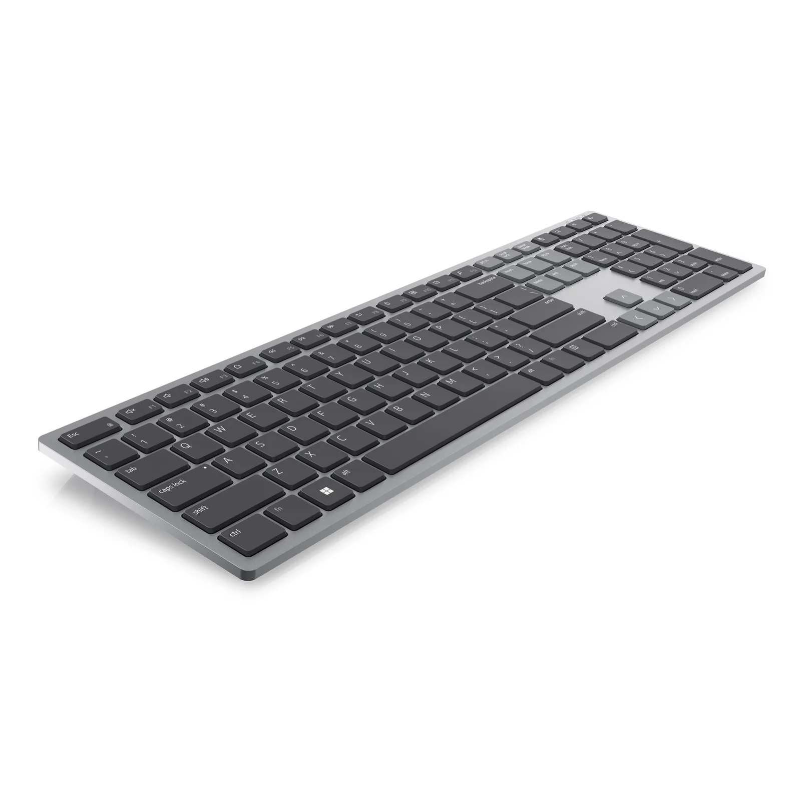 Vue trois-quarts arrière du clavier mettant en valeur la barre d'espace, les touches modificateurs et le contour aluminium