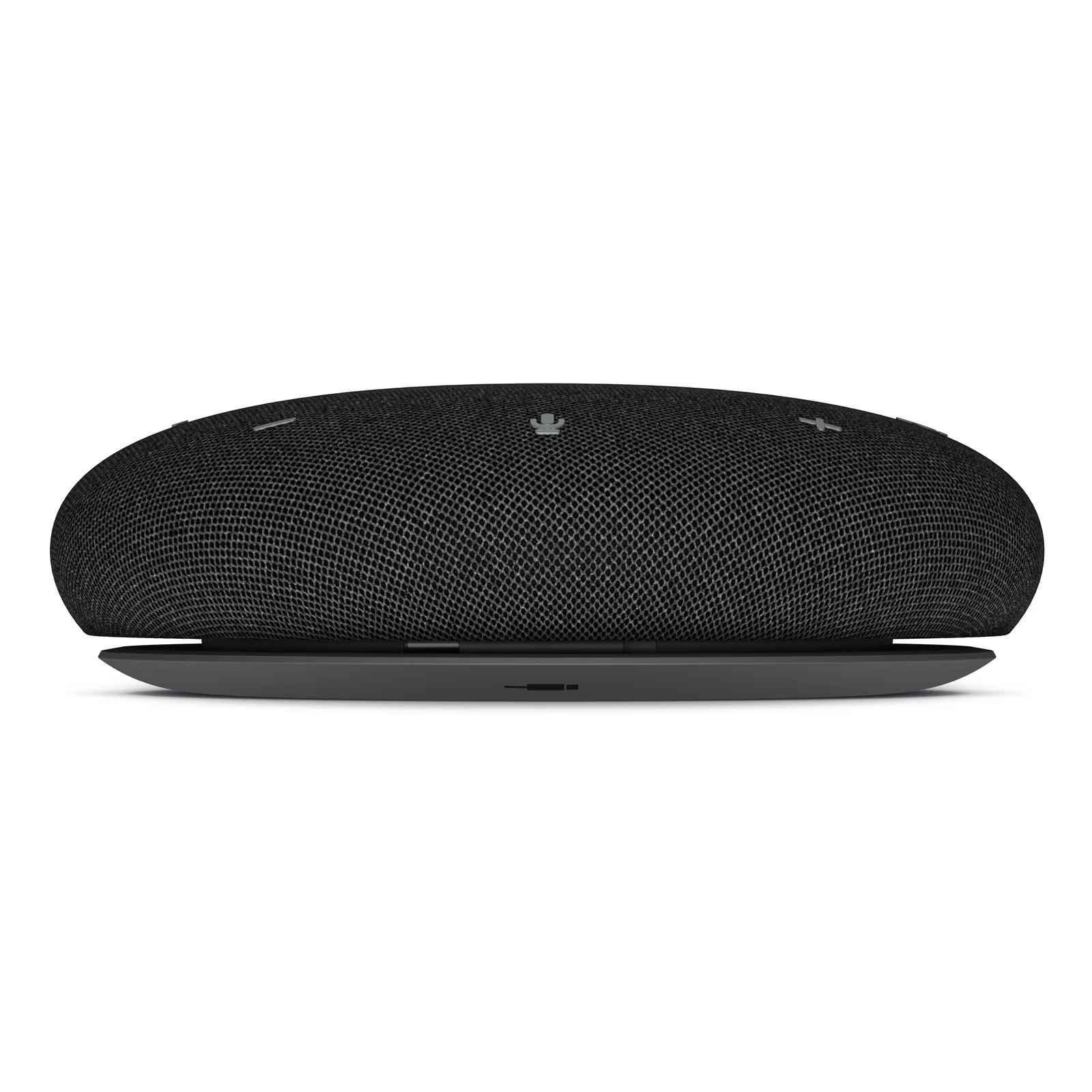 Vue frontale latérale du speakerphone montrant la grille tissu bombée, le socle plastique fin et les boutons de volume sur le pourtour