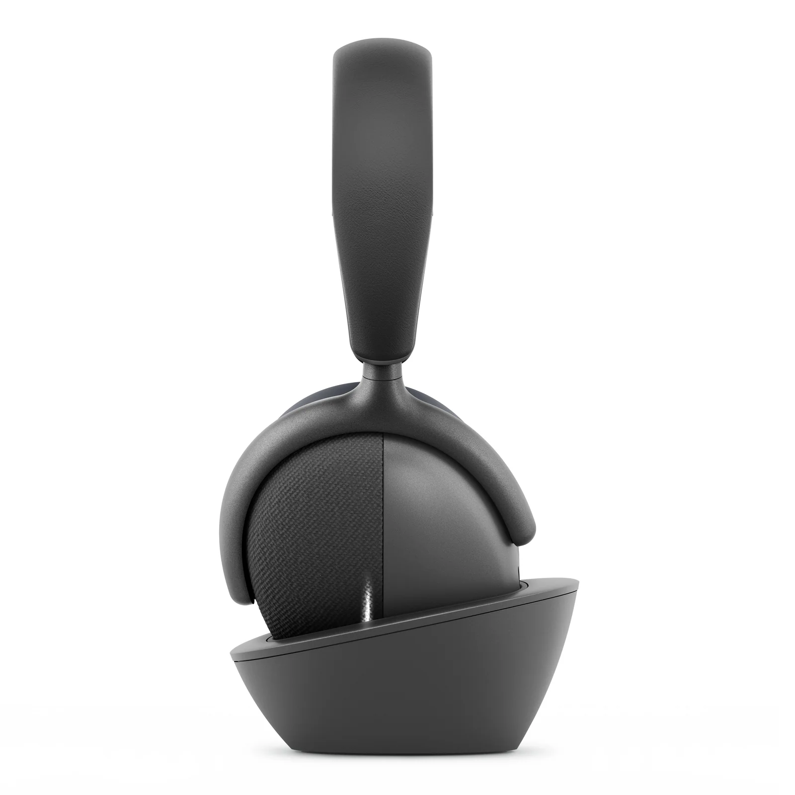 Vue latérale du casque sur sa base de charge, profil bas et arceau noir mat