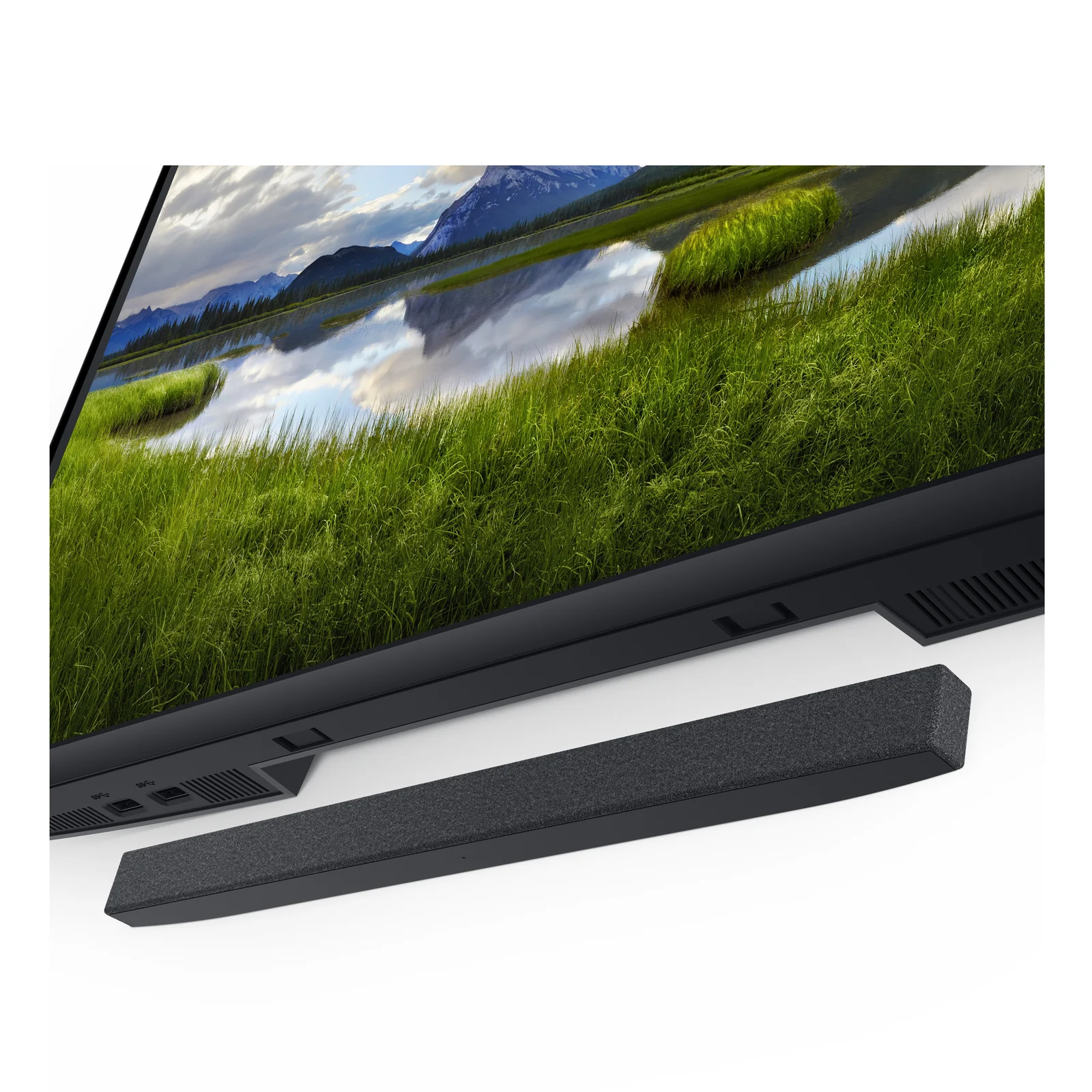 Moniteur Dell vu de face avec barre de son installée sous l'écran et pied argenté.