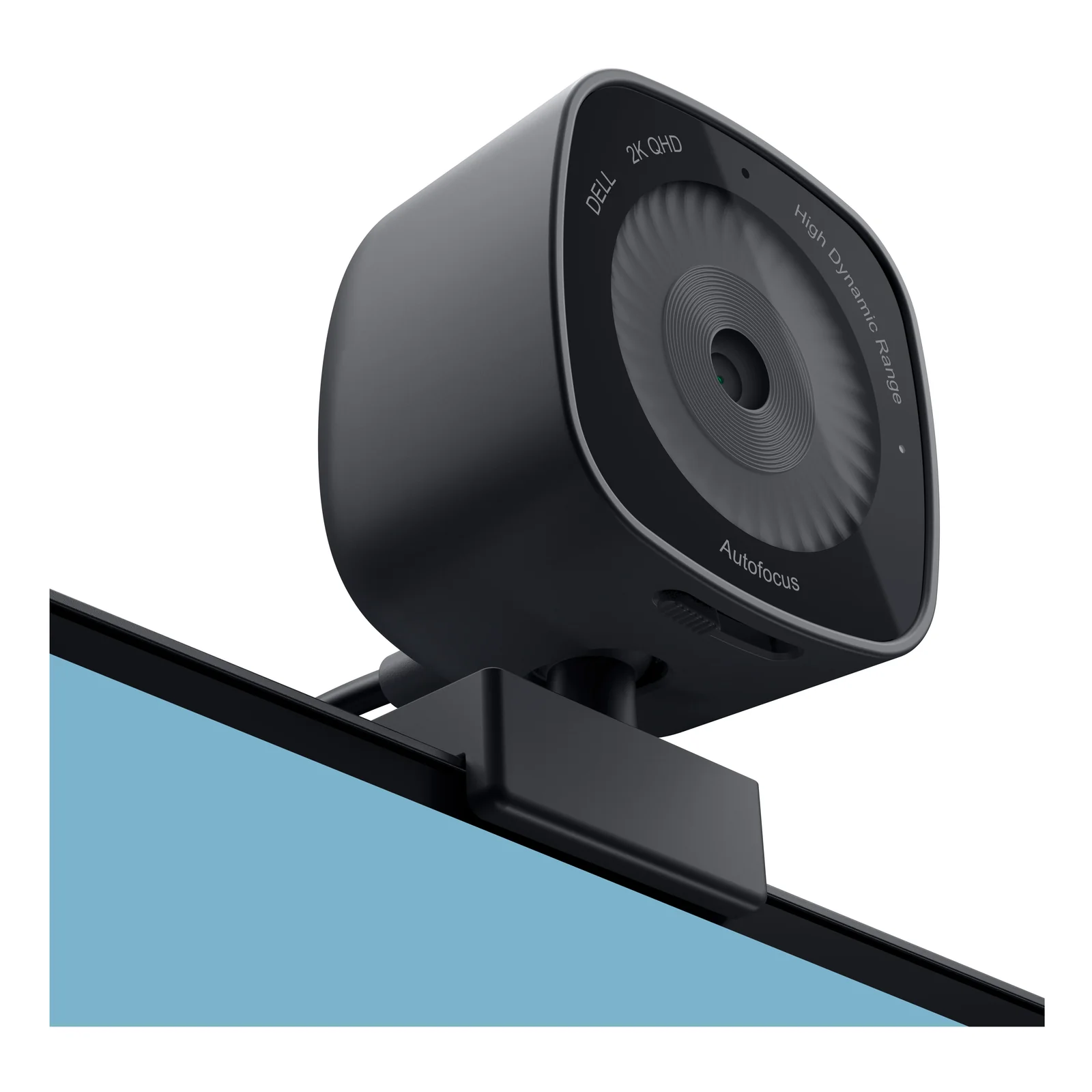 Webcam fixée sur la tranche d'un écran par son clip, objectif tourné vers l'utilisateur