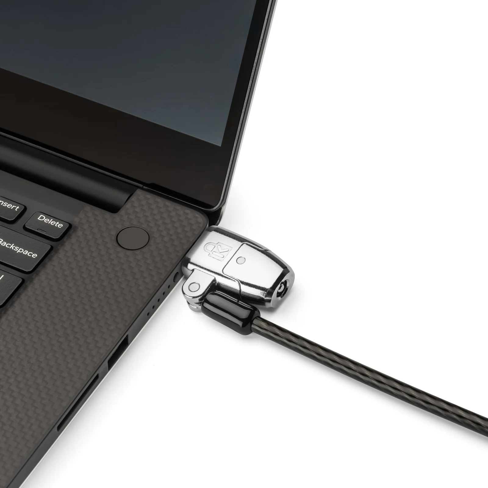 Vue latérale du câble Kensington inséré dans le slot d'un laptop fermé