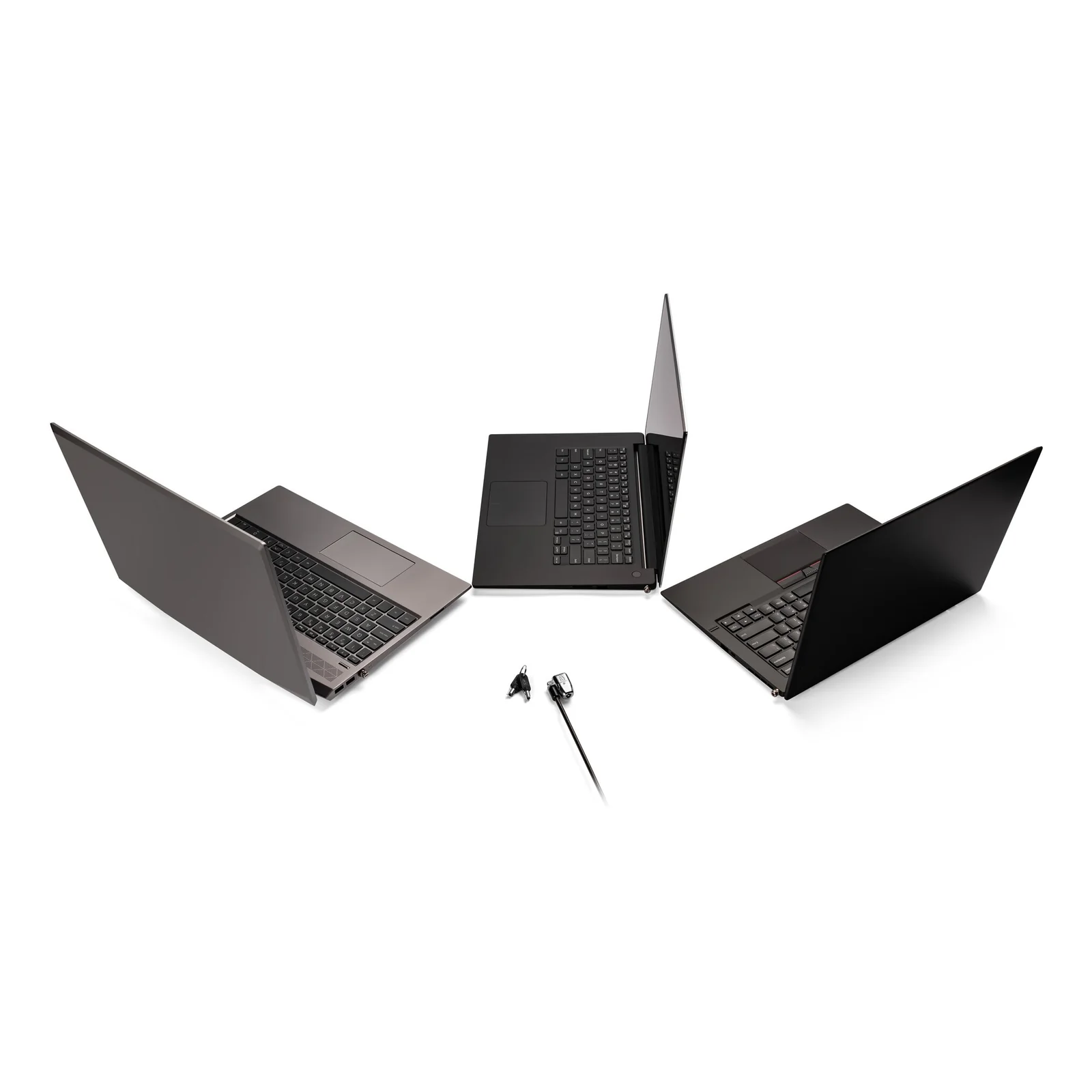 Trois ordinateurs portables de marques variées avec le câble antivol ClickSafe 2.0