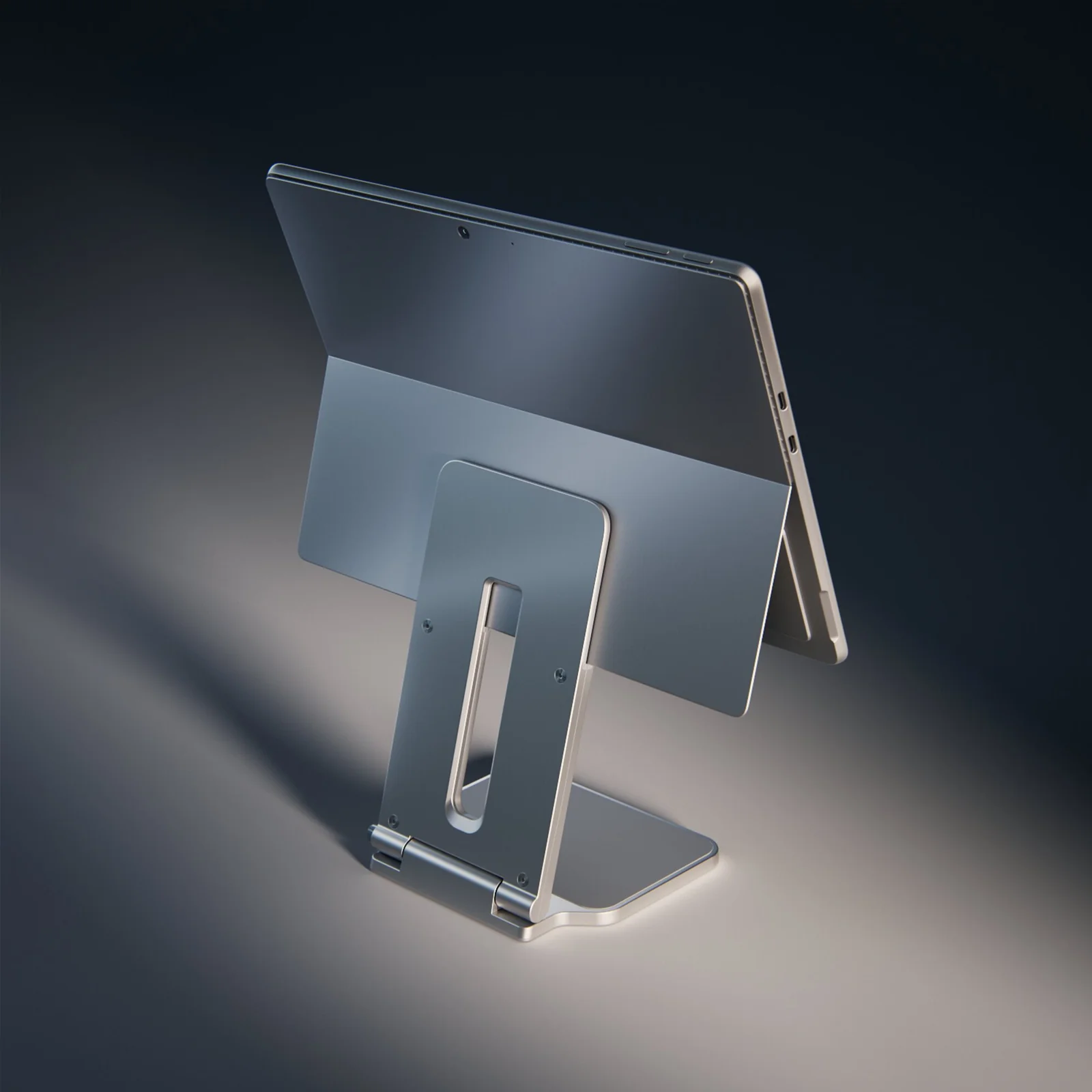 Stand Surface Pro sous éclairage sombre dramatique, angle arrière droit, fond noir