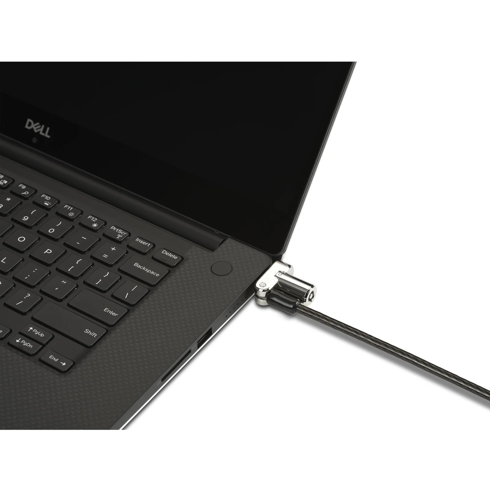 Gros plan du câble antivol Kensington connecté à l'encoche d'un PC portable Dell, vue latérale
