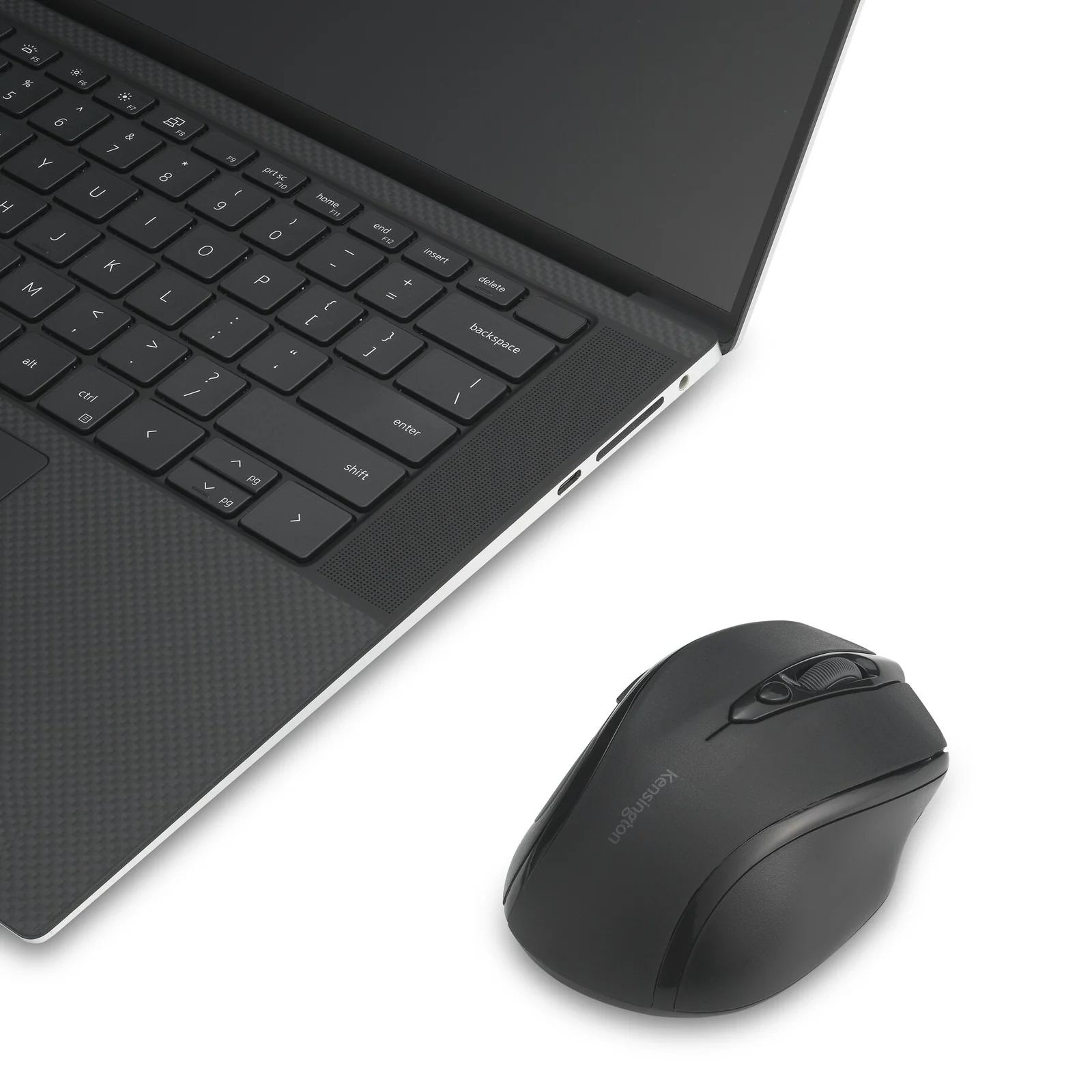 Souris Kensington MY310 EQ posée à côté d'un clavier de laptop pour comparaison de taille