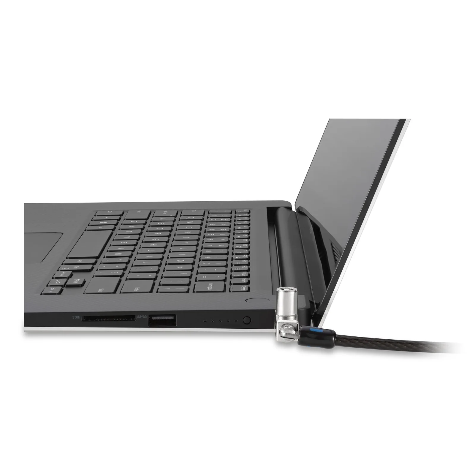 Tête de verrou à plat contre le slot de sécurité d'un laptop gris foncé, vue de côté