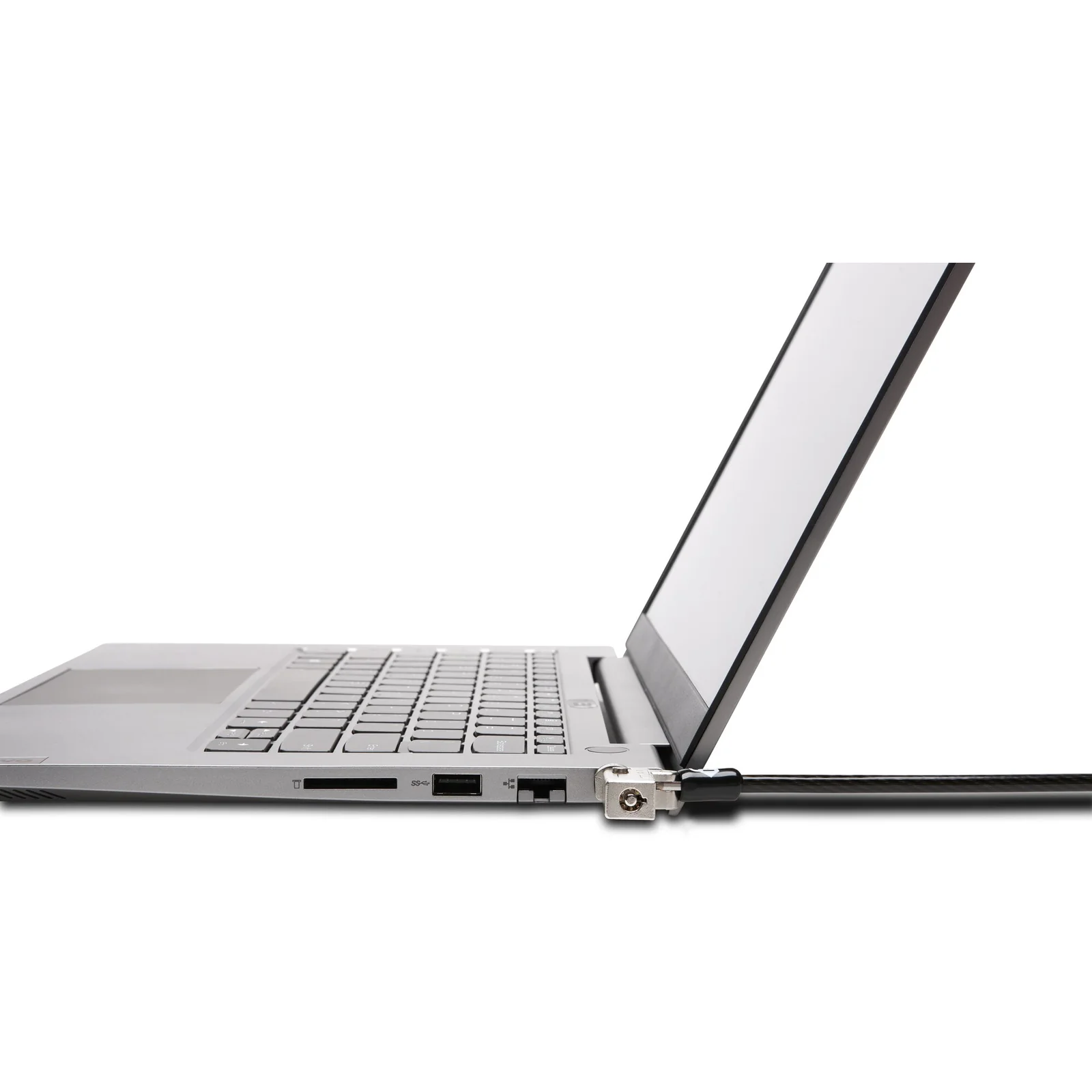 Vue latérale d'un ordinateur portable posé à plat avec le câble Kensington NanoSaver 2.0 inséré