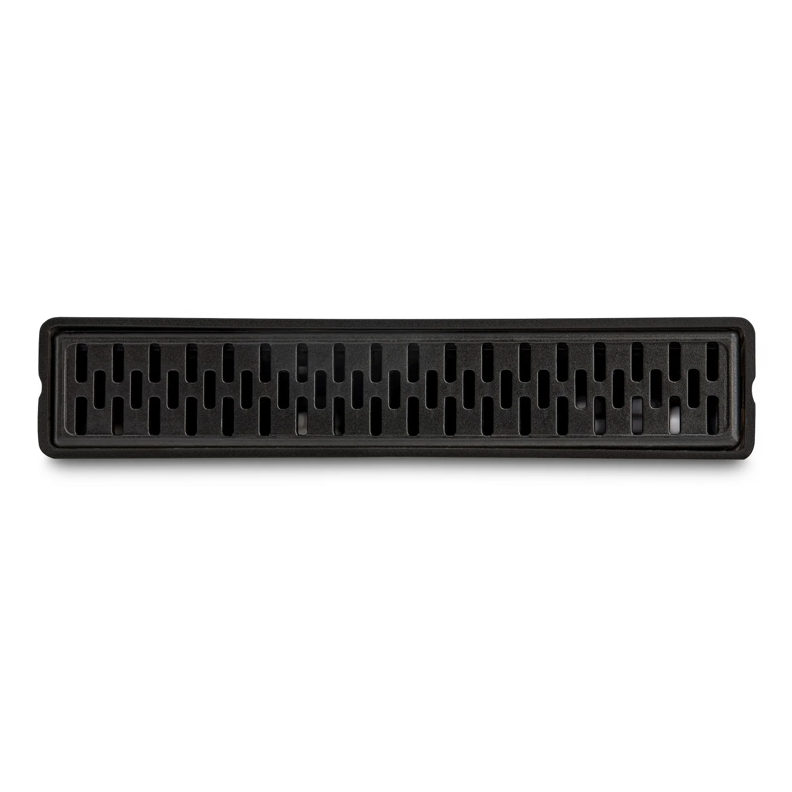 Face inférieure du boîtier vue de dessus, entièrement recouverte d'une grille de ventilation à fentes rectangulaires