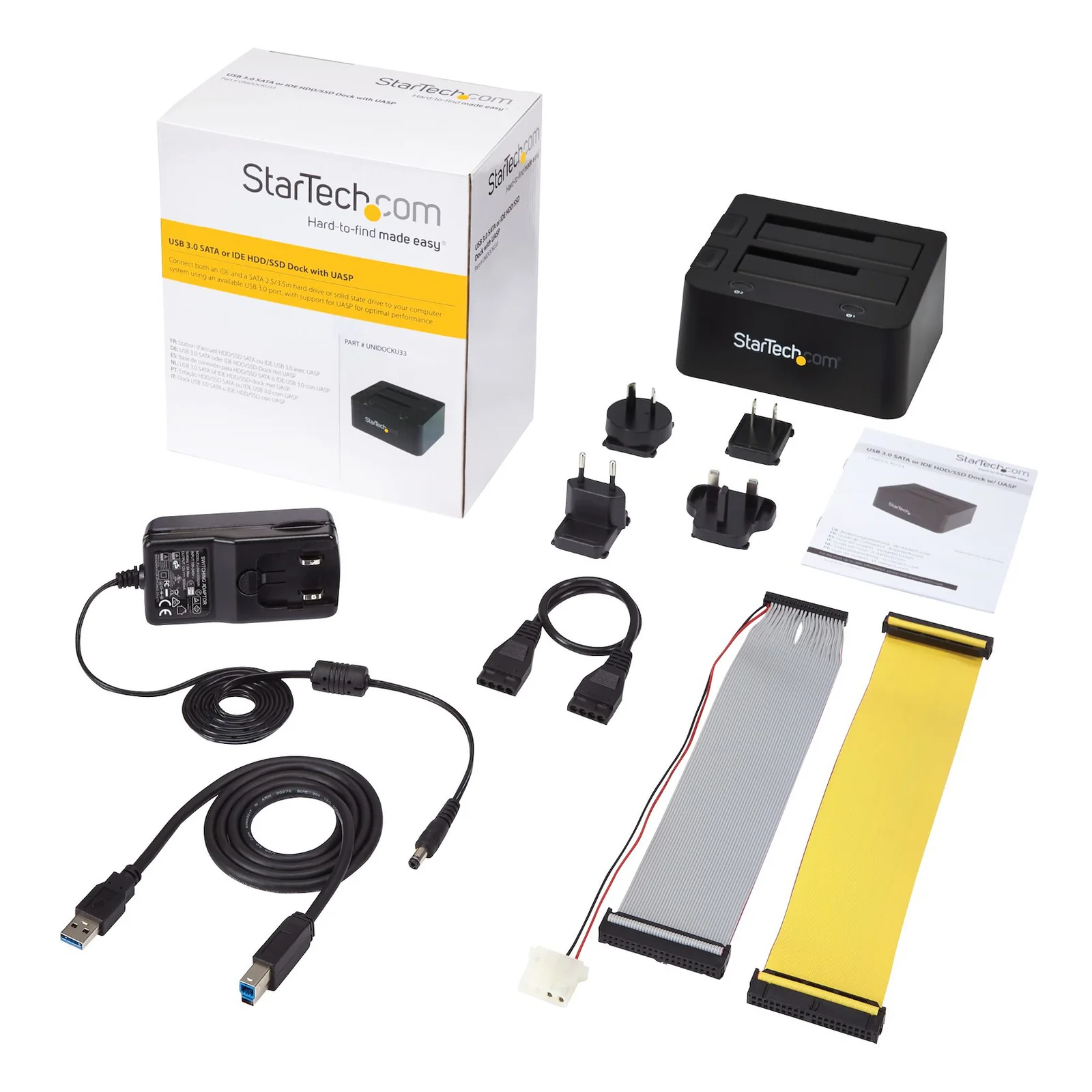 Vue d'ensemble du contenu avec boîte de vente blanche, station, câbles IDE, câble USB 3.0, adaptateurs secteur multi-pays et guide d'installation