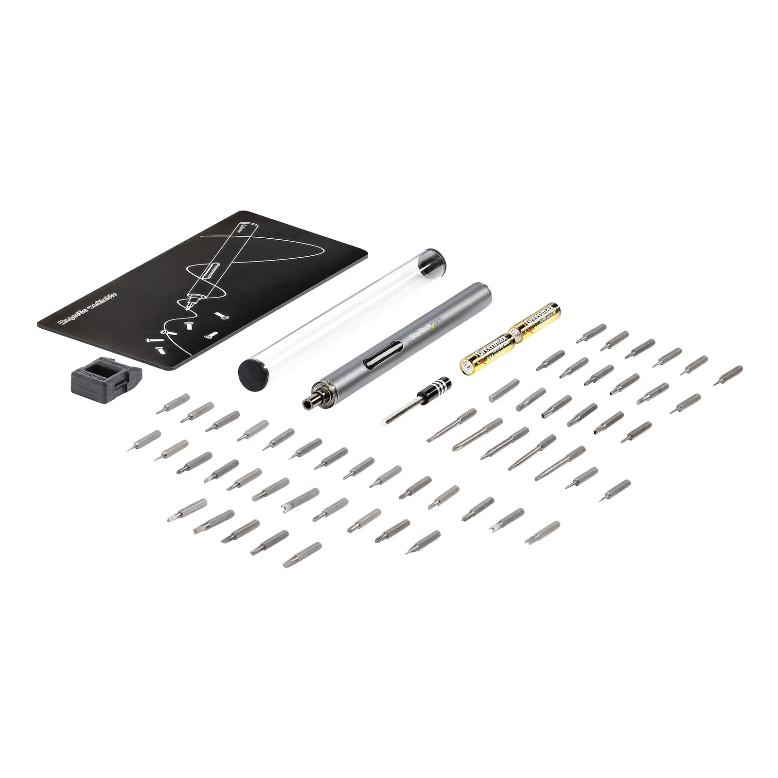 Vue d'ensemble du kit déballé avec tournevis, tube transparent, rallonge, piles, embouts étalés, tapis magnétique et outil de magnétisation