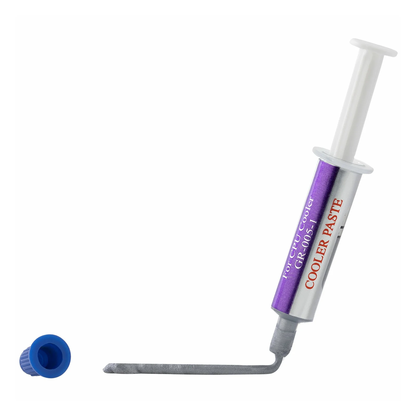 Seringue de pâte thermique inclinée avec bouchon bleu retiré posé à côté, pâte grise visible à l'embout et spatule d'application métallique