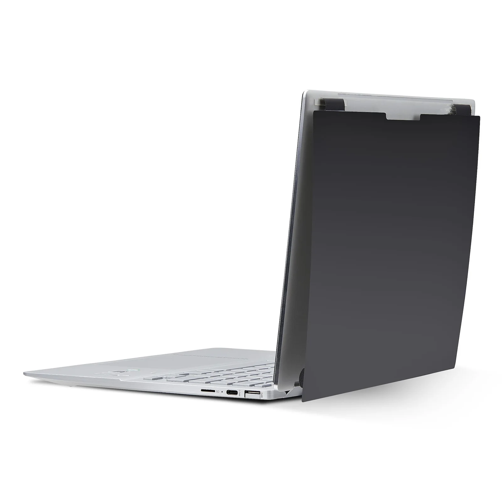 Vue latérale du laptop avec le filtre replié contre le couvercle en position de stockage