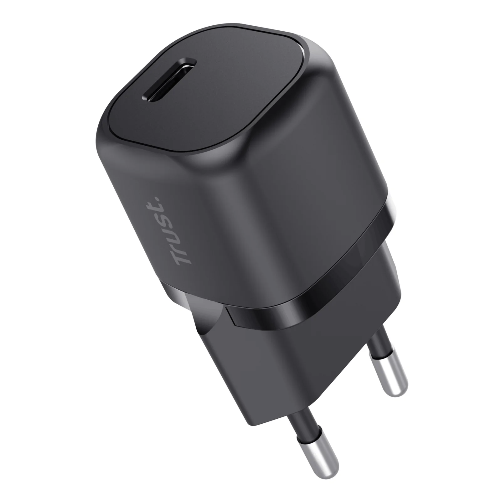 Chargeur secteur noir, vue frontale, port USB-C visible, logo Trust, proportions légèrement plus grandes