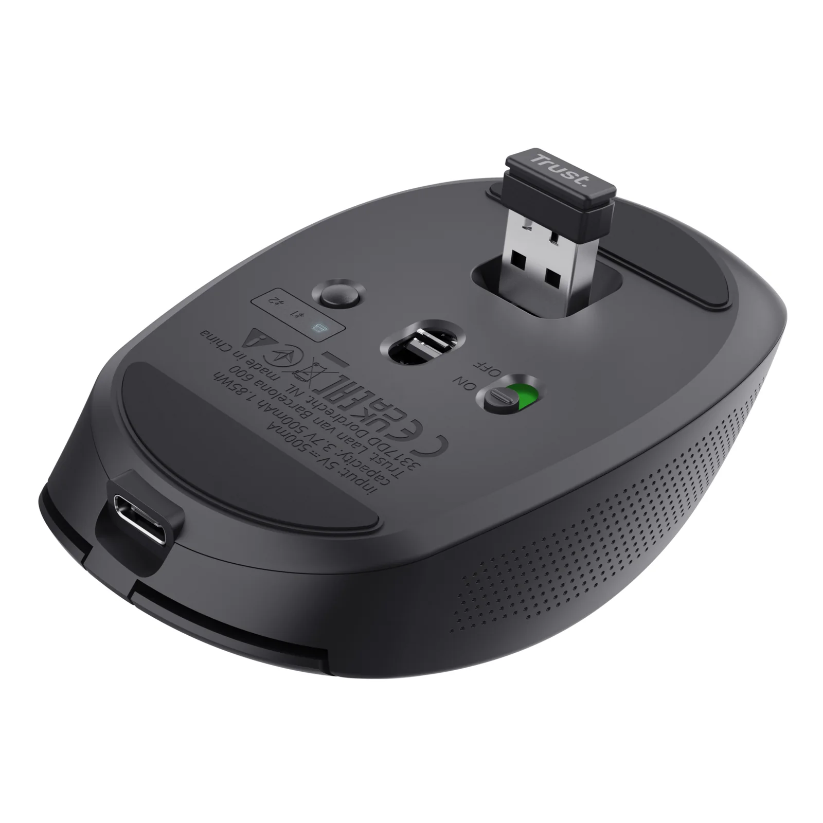 Vue du dessous de la Trust Ozaa, logement nano-récepteur USB ouvert, voyant LED vert et interrupteur on/off