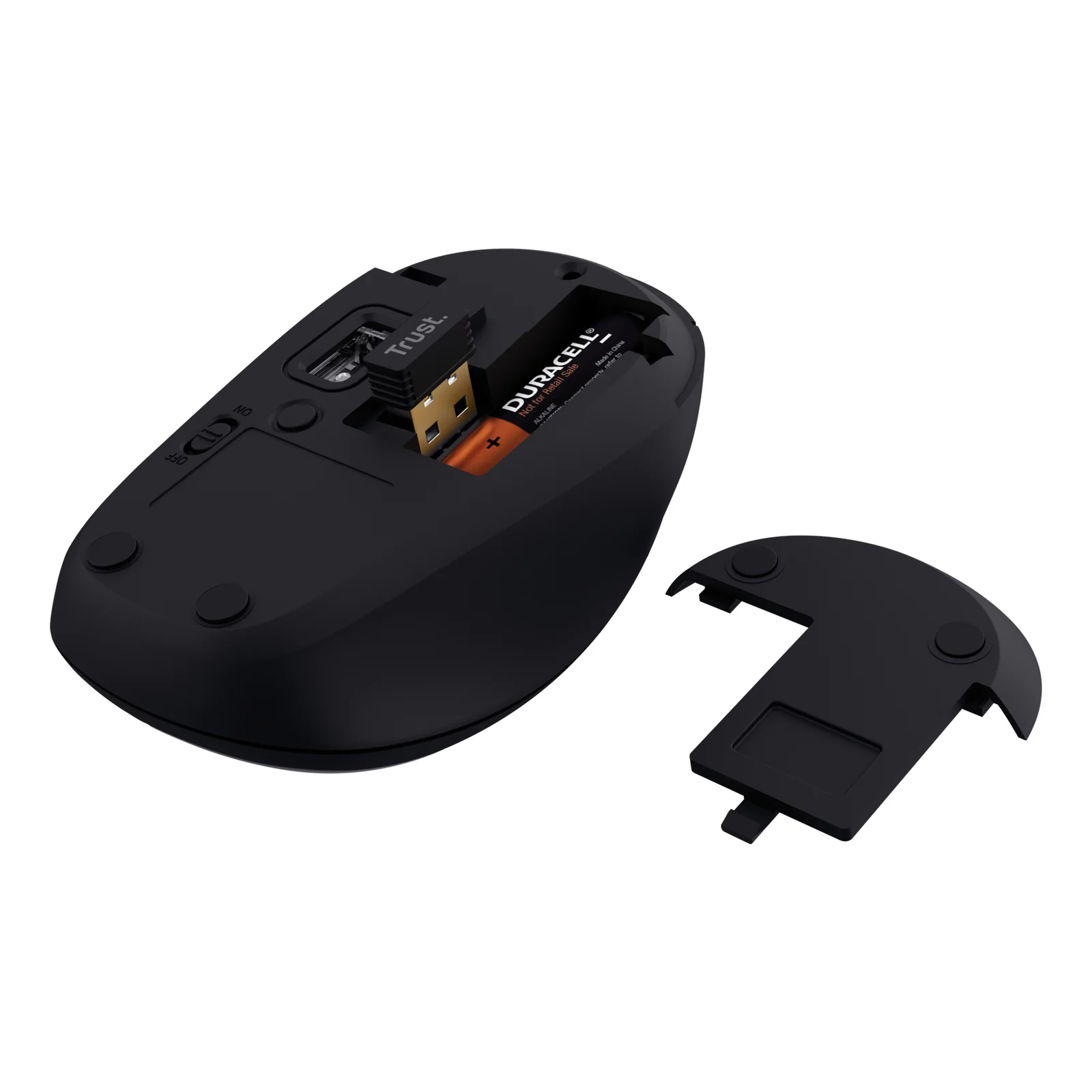 Vue du dessous, souris noire retournée, compartiment batterie ouvert, récepteur nano USB rangé à l'intérieur
